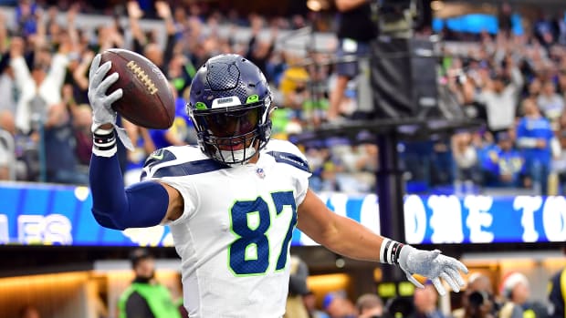 Seattle Seahawks tight end Noah Fant (87) celebrates his touchdown scored against the Los Angeles Rams during the first half at SoFi Stadium.